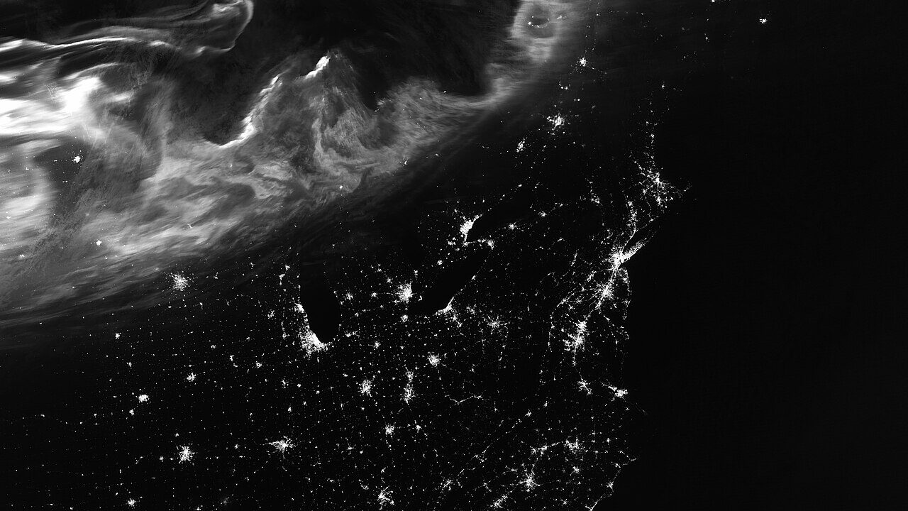 A Spacecraft Photographs a Complete Auroral Oval From Above the Pole