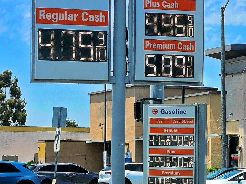 Gas station price sign showing gasoline prices