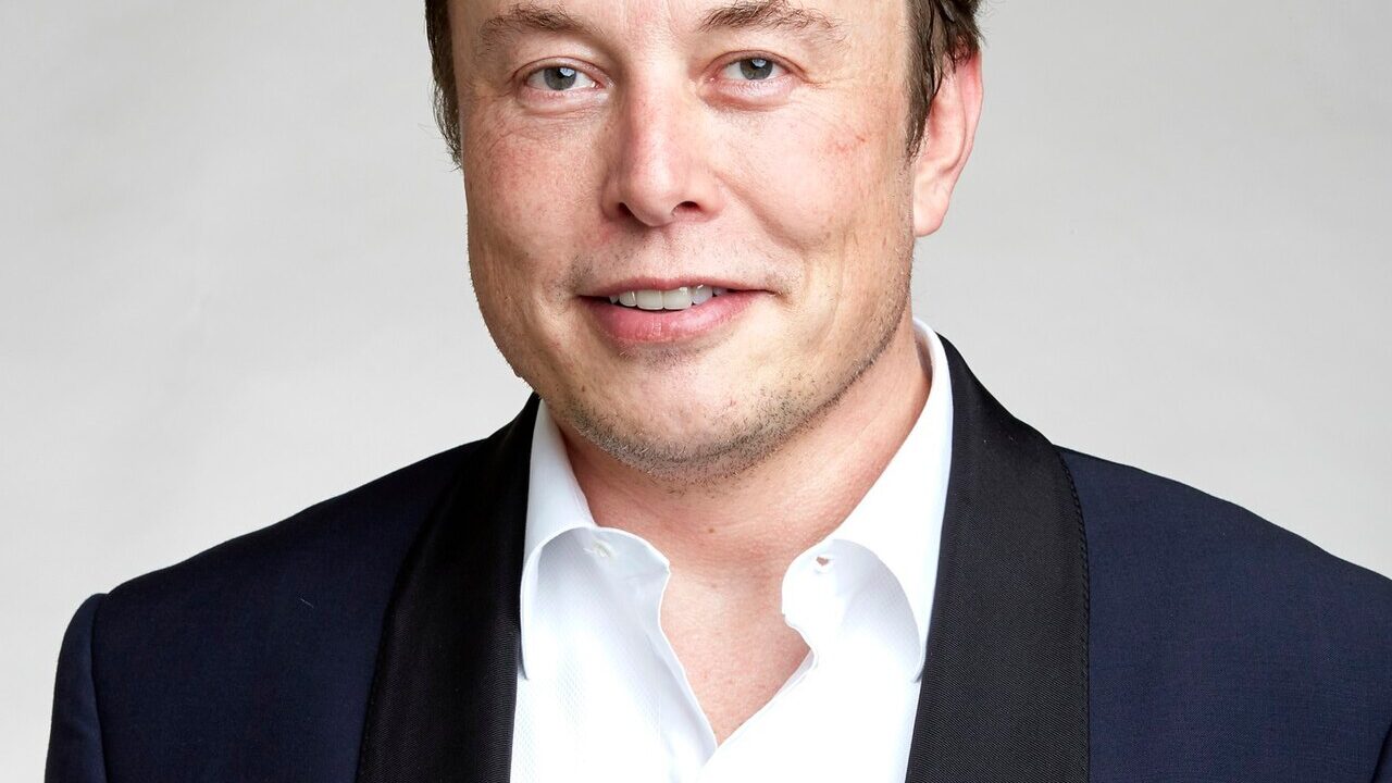 Elon Musk portrait in a dark suit