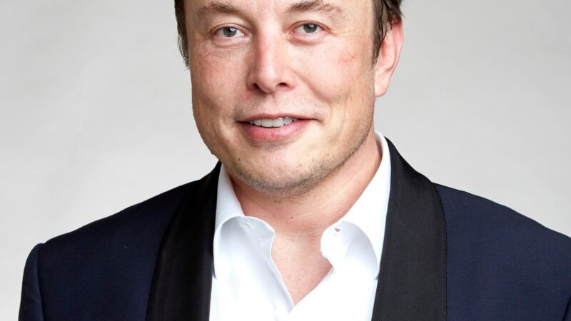 Elon Musk portrait in a dark suit